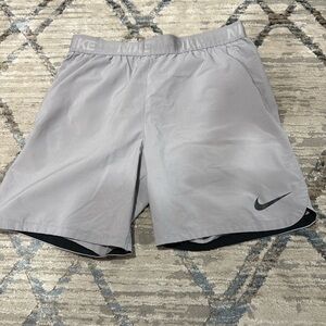 Silver Nike metal vent tech training shorts